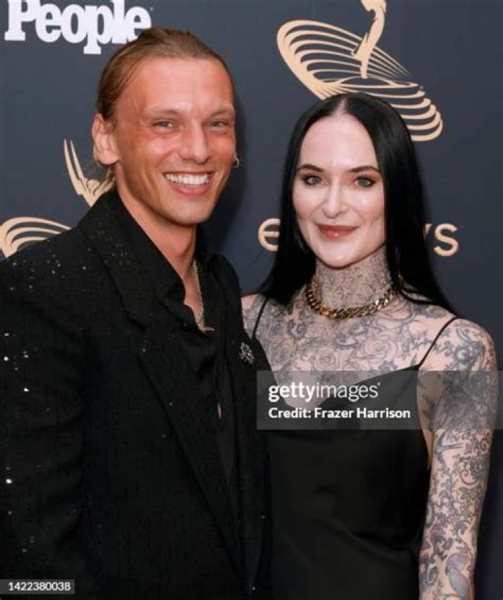 Jamie Campbell Bower And Jess Moloney
